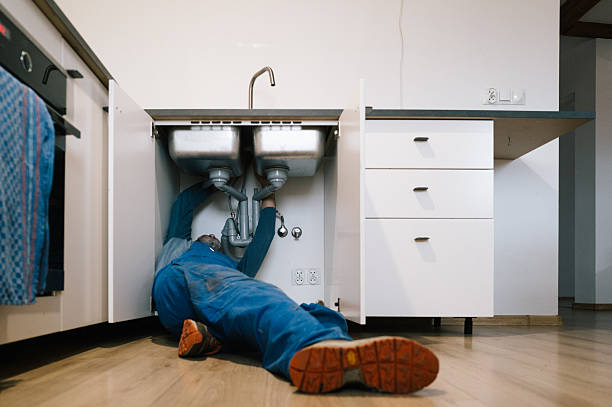 Professional Emergency Plumber technician working in Zimmerman, MN